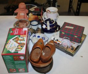 Miscellaneous Lot of Items Including wooden shoes, gingerbread kit, apple baker, and bowls.