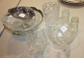 Group Lot of Glass Includes: Sugar, spooner, salt and pepper, coasters, silverplate shell dish, and glass bowl with plate rim.