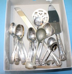 Lot of Silverplate and Stainless Lot consisting of Gorham stainless blade cake knife, Sheffield stainless blade cake knife, 3 silverplate reticulated serving spoons, 13 international silver various state souvenir spoons, and other various spoons