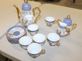 Small Japan Lusterware Tea Set Teapot, creamer, sugar, 6 cups and saucers, teapot, 7