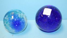 Two Blue Glass Paperweights
