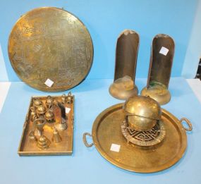 Group of Brass Which Includes candleholders trays, trivet, and bells.