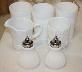7pcs of Grape Pattern Milk Glass 3 glasses, small and footed glass, creamer, salt and peppers, shakers.