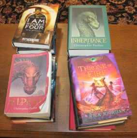 Books by D'Lacey, Haddix, Lore, Poolini, and Riorden