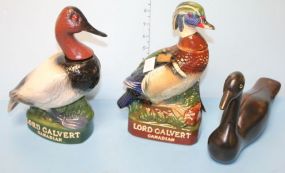 Two Lord Calvert Canadian Ceramic Decanters and Wood Carved Duck