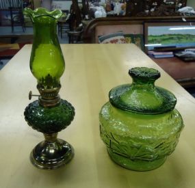 Oil Lamp and Jar with Lid Small green glass oil lamp 9 1/4h and green jar with lid 6 1/4