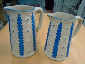 Two Blue and White Pitchers