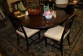 Mahogany Oval Dining Table with Four Chairs