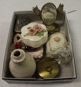 Group of Dresser Top Items Including perfume bottle, small lipstick mirror holder, covered jars.