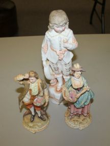 Pair of Andrea Porcelain Figurines and Bisque Figurine of Young Boy Holding Flowers