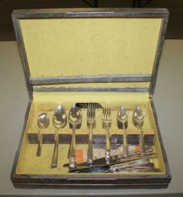 Rogers Brothers Silverplate Flatware Consisting of sugar spoon, 10 tablespoons, 8 dinner forks, 8 salad forks, 5 knives, butter knife, 8 tablespoons, 16 teaspoons, 2 serving spoons.