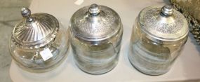 Three Glass Round Jars (one broken at top)