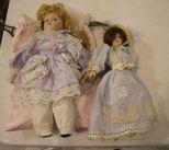 Two Dolls and Satin Bag