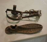 Iron Shoe and Rusted Animal Trap