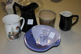Various Pieces of Pottery Mugs, creamers, and two vases.