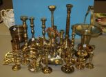 Large Group of Brass Candlesticks and Other Decorative Brass Items
