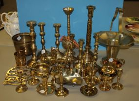Large Group of Brass Candlesticks and Other Decorative Brass Items
