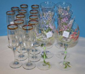 Set of Twelve Gold Rim Champagne Flutes and Eight Hand Painted Wine Glasses