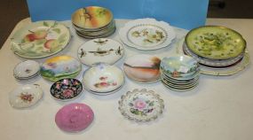 Large Group of Handpainted Porcelain Plates and Bowls