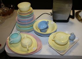 Lu Ray Pastels Including 5 Plates, 8 cereal bowls, 12 saucers, 2 berry bowls, bowl, salt, 2 cups, 3 vegetable bowls, platters, creamer and sugar, gravy.