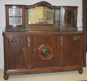 Large Oak Two Piece Sideboard with Mirrored Back, Two Curved Glass Curio Cases, and Pull Out Serving Board