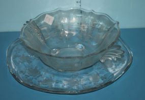 Clear Etched Footed Depression Glass Bowl along with a Clear Etched Glass Plate
