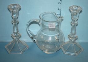 Pair of Glass Candlesticks and a Glass Pitcher