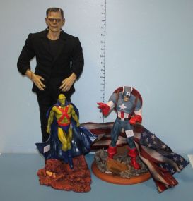 Action Figurines Martian Man hunter, Captain America, and Frankenstein.