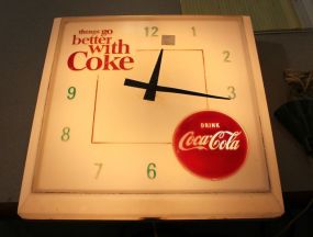 Things Go Better with Cake Lighted Clock does work