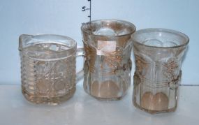 A Depression Glass Pitcher and Two Depression Glass Tumblers