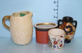 Coalport 1892 Pitcher, cauda Holland Jug by Regina Sibwega, Sandland Ware Vase, and a Royal Copenhagen Burnt Orange Vase