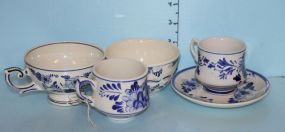 Four Blue Delft Cups and One Saucer