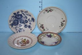 Group of Four Saucers