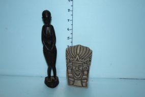 Black Tribal Woman and the Bust of a Tribal Man