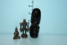 Hummel-Hummel Hamburg Figurine, a Brass Buddha, and a Glass Totem Pole Figurine