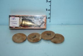 Four Wooden Nickels and a Fishing Lure