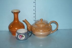 Orange Luster Teapot, Vase, and a Blue RS German Luster Cup