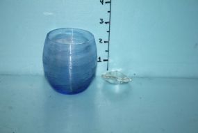 Small Blue Shot Glasses and a Glass Facet