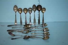 Twenty Silverplate Spoons and One Knife