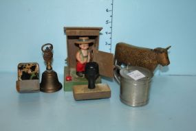 Small Brass Bell, Bronze Cow, Rubber Stamps, Pewter Condiment, and a Young Farmer in the Outhouse