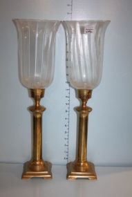 Two Brass Candle Holders with Glass Hurricane Shades