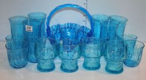 Group of Blue Anchor Hocking Glasses and a Blue Thumb Print Glass Basket