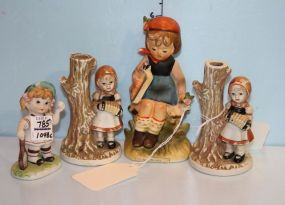 Group of Four Porcelain Figurines