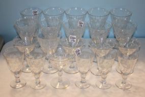 Set of Twenty-One Stem Glasses with Thumbprint Design