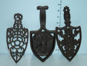 Three Cast iron Trivets