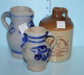 Two Small Blue and Grey Westerwald Pitchers and a Small Daniel Boone Whiskey Jug (1974)