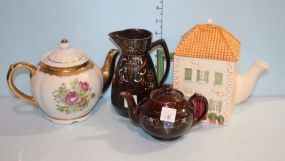 Three Tea Pots and a Hand Painted Creamer