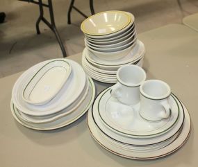Thirty-one Pieces of Stoneware China in Various Patterns