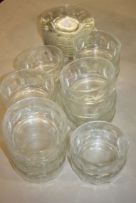 Thirty Pieces of Clear Glass Bowls and Plates