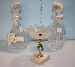 Two Lead Crystal Decanters along with a Cupid Based Compote on Marble Base